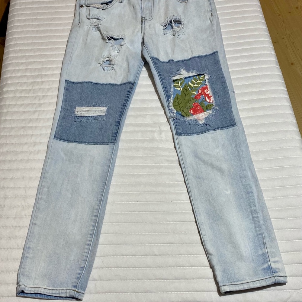VIP Patch Distressed Skinny Jeans